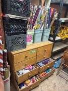 Eight drawer dresser, full of gift wrapping and party items plus large quantity of wrapping paper