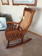 Kraus Furniture Amana  solid walnut arm rocker, solid seat cane back