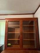 26D x 56L x 90H two piece kitchen cupboard with glass front doors on top and 15 drawers on bottom May need tools to take apart