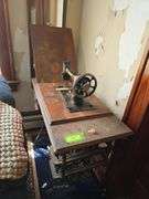 Singer treadle Sewing machine we Think these drawears fit the machine but they are at another location.