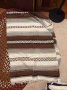 Southwestern style blanket and oval braided rug 28x48