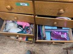 Eight drawer dresser, full of gift wrapping and party items plus large quantity of wrapping paper