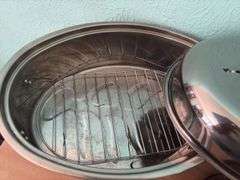 Stainless steel roaster and two granite ware roasters