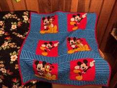 Two machine stitched quilts-44x50 and 42x52
