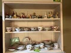 Lots of cute knick knacks and cups & saucers (We don’t know if they match!)