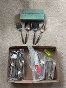 Various flatware and serving spoons