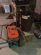 Trash can, bleacher cushions and three wooden step stools
