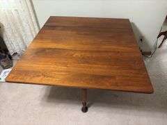 Kraus Furniture Amana walnut gate leg drop leaf dining table 45 x 60 with (3) 12" leaves, table pads, turned legs.