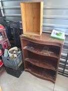Two shelving units and lots of smaller shelves and storage items plus group of apple kitchen items