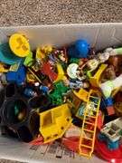 Box of assorted Fisher Price people and animals along with a bunch of other small toy items