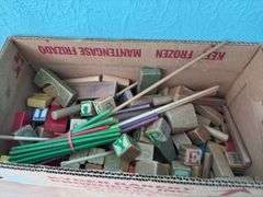 Box of many old blocks, different sizes and very annoying roller toy