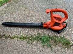 Black &  Decker corded leaf blower/vac, bagger never used, and drop cord