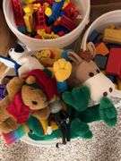 Duplo large Lego blocks, bucket of stuffed animals, bucket of wooden blocks