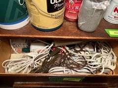 Four drawers of stuff includes extension cords and lots of light bulbs