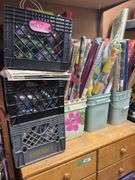Eight drawer dresser, full of gift wrapping and party items plus large quantity of wrapping paper