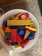 Duplo large Lego blocks, bucket of stuffed animals, bucket of wooden blocks