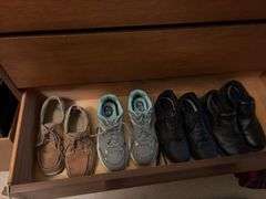 Contents of dresser includes various men’s shirts, sweaters and shoes All various sizes