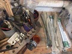Large quantity of hand tools on top of bench