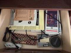 TV stand 19D x 42L x 24H, VHS/DVD player, tapes, CDs, clock/thermometer/humidistat