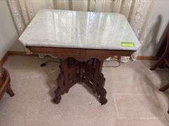 Antique Eastlake style marble top walnut parlor table with original porcelain casters 22 x 30 Per Seller inventory, top was cut from the countertop of old Norway bank