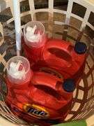 Lots of laundry soap, grime boss floor sweeper and laundry basket