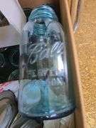 Box of blue canning jars of various sizes