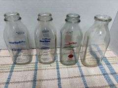 8 bottle carrier with 4 milk bottles