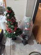 2 small pre-decorated Christmas trees