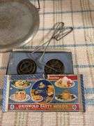 Aluminum griddle and Griswold Patty Molds, box in bad shape