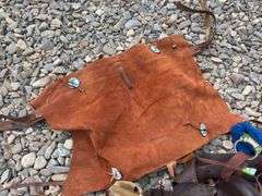 Vintage saddle, chaps, and saddle, blanket with beaded detail