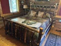 QUEEN sized knotty pine bed frame with mattress box spring and linens