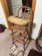 Antique wooden high chair and baby shoes Per Seller dates back to 1877