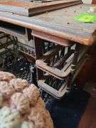 Singer treadle Sewing machine we Think these drawears fit the machine but they are at another location.
