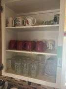 Ceramic dishes, and lots of drinking glasses