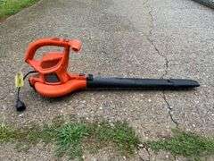 Black &  Decker corded leaf blower/vac, bagger never used, and drop cord