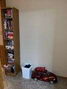 12D x 12L x 72H shelf unit w/ VHS movies, RC car, slot car track and 3 slot cars