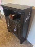 Small cupboard with floral painted design