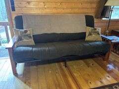 Futon, side table and lamp