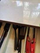 Small cupboard with enamel top and some cookware