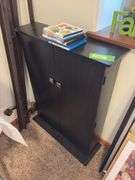 160+ DVDs and storage cabinet