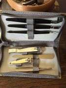 Various costume jewelry, dresser mirror, fingernail sets, watches, etc
