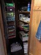 Household fix-it type items, and craft supplies in closet plus over the door storage