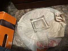 Clear glass and white glass waiting to be hand painted, wreathes for decorating, etc