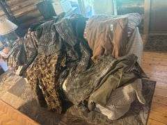 large assortment of camo and hunting clothing mostly XL