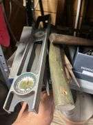 Gas cans, small galvanized trash cans, files and other tools PLUS THE SHELF Shelves 3 & 4