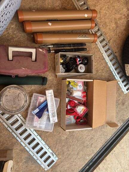 Fishing rod holders, two folding poles, reals, tackle box in blue laundry tub image