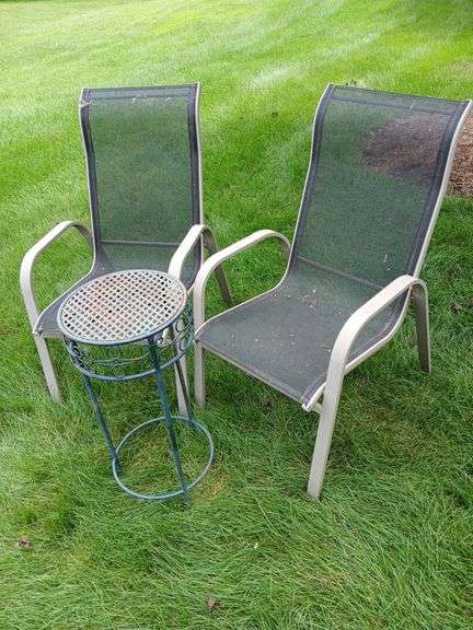 2 stacking aluminum frame chairs and small table image