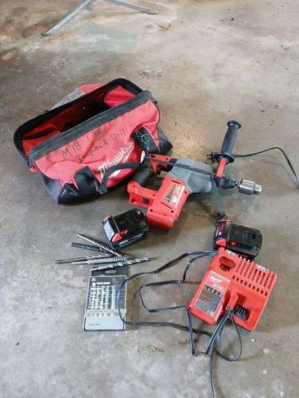 Milwaukee M18 rotary hammer drill, charger and 3 & 5 Ah batteries image