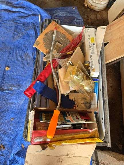 Refrigerator drawer full of tools, etc as shown image