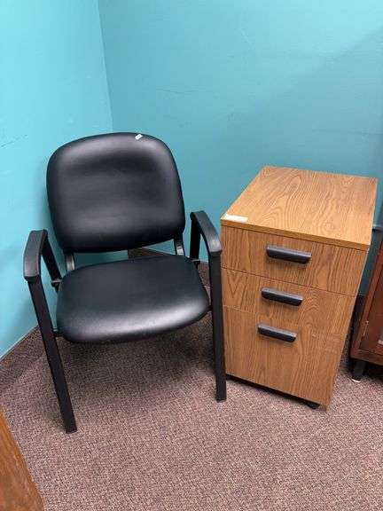 Three drawer pedestal base on rollers, black side chair image